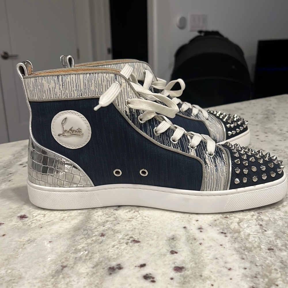 Like new Christian loubutin sneaker 10.5 blue denim spikes